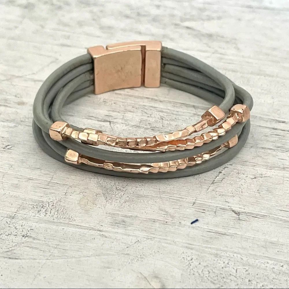 Rose gold tone and grey multi strand bracelet